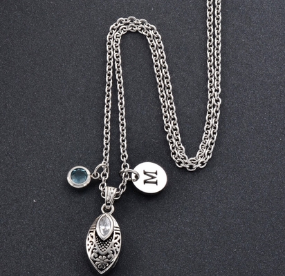 Leaf-shaped Cremation Jewelry Necklace with Chrysanthemum Engraving and Birthstone OEM/ODM